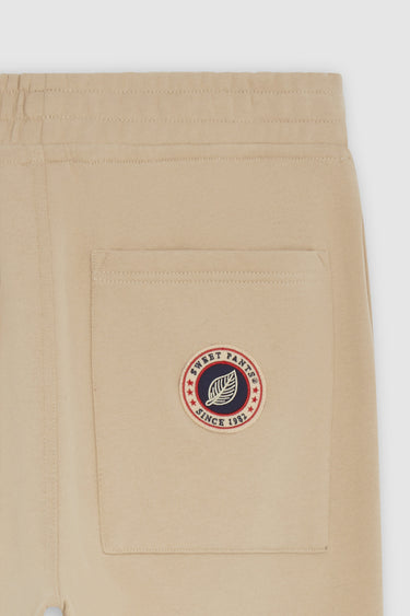 COACH OVERJOGG WHITE PEPPER